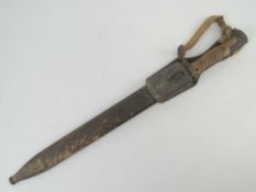 A WWI G98 German bayonet having sawback blade, dated 1916 and bearing makers mark C.G.HAENEL SUHL.