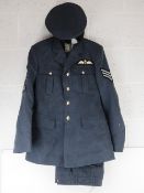 An RAF No1 Dress uniform with peaked cap, having cloth patches upon.