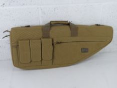 A 9.11 Tactical Series canvas gun bag, with original foam inside.