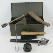 A British Military Landrover kit box containing brushes, tyre spanner etc.