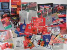 A quantity of assorted British Grand Prix and motor racing meet lanyards, year books, and tickets.