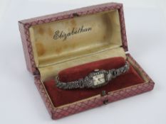 A HM silver and marcasite ladies cocktail wrist watch having Swiss Hefick Watch Co 15 jewel manual
