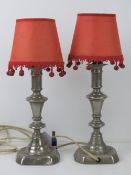 A pair of chrome table lamps with shades, for re-wiring.