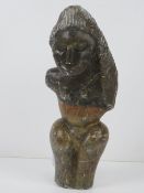 A soapstone fertility figurine standing 28cm high, a/f.