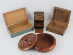 A selection of four assorted lidded boxes of various forms and sizes.