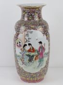 A large Chinese shoulder vase having female figures upon with pink and blue floral decoration and