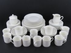 A quantity of Royal Doulton 'Regency White' tea and dinnerware comprising dinner plates,