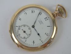 An open faced pocket watch marked W.