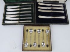 A set of six HM silver coffee spoons having 'bean' terminals within original case,