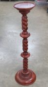 A torchere or planter stand having barley twist column, standing 97cm high.