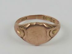A 9ct rose gold gentleman's signet ring, hallmarked 375, unengraved, size T, 4.