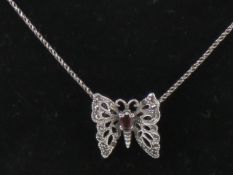 A delightful silver and marcasite butterfly pendant on rope twist chain, pendant 2.