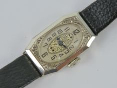 A 14ct gold Art Deco Gruen ladies manual wind wrist watch c1920s Cartouche style,