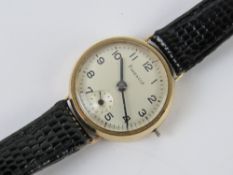 A 9ct gold ladies wrist watch having manual Pinnacle movement, crown wheel deficient,