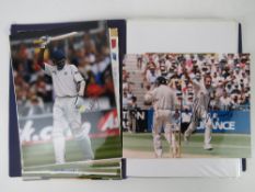 An album containing a very large quantity of signed, colour photographic prints mainly signed,
