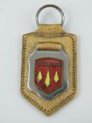 An enamelled Hillman car key fob.