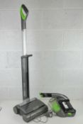 G-Tech; a wireless freestanding vacuum together with a hand held cleaner. Two items, with charger.