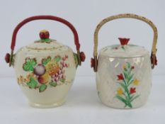 Two ceramic relief pattern wafer / biscuit barrels, each with woven handles,