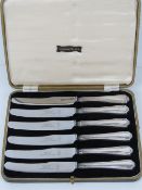 A set of HM silver handled butter knives in fitted box, hallmarked Sheffield 1937.