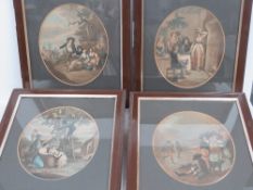 A set of twelve months of the year re-struck oval mounted prints in wooden frames,