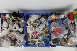 A quantity of assorted mini TY beanie babies, McDonalds toys, Walkers Crisps toys etc.