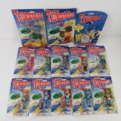 A quantity of thirteen assorted Matchbox Thunderbirds figurines, in original packaging, c1990s.