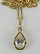 A 9ct gold and CZ pendant of teardrop form on 9ct gold chain, total weight 2.3g.