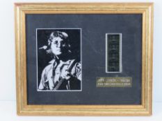 An original limited edition film cell 'John Lennon - Imagine' in frame with certificate of