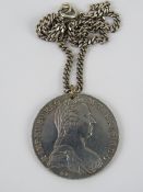 An Austria Maria Teresa Thaler silver bullion coin (833 silver), converted for use as a pendant,