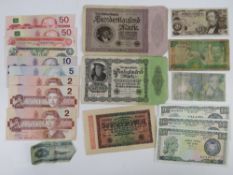 A quantity of bank notes inc Canadian 2 dollar (x3), 5 dollar, 10 dollar,