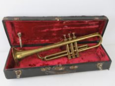 A vintage brass trumpet within original fitted case, slightly a/f, having mouthpiece.