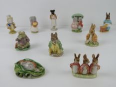 Beatrix Potter Beswick figurines each bearing brown back stamp.
