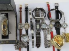 A quantity of assorted ladies wristwatches including a HM silver example a/f, Swatch, Seiko in box,