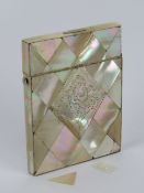 A mother of pearl card case having centr