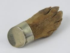 A Victorian otter paw brooch having silv
