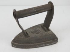 A No3 cast metal iron having ace of club