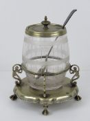 A barrel shaped glass condiment pot havi