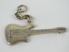 An unusual HM silver key chain in the fo
