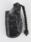 A Lansky Sharpeners pocket knife in leat