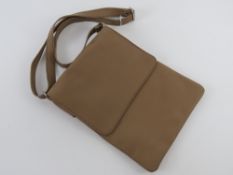A contemporary leather cross body bag by Vera Pelle Italy, approx measurements 23cm wide, 27.