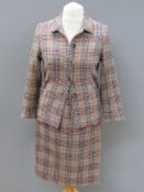 Designed and made by Rosemarie van Bree; Two piece jacket and skirt suit in tweed,