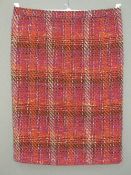 Designed and made by Rosemarie van Bree; an orange and purple tweed skirt,