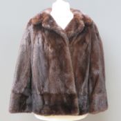 A vintage fur coat bearing label for Smith & Sons Ltd Northampton, approx measurements; 42