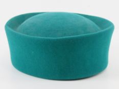 A green 100% wool felt hat by Kangol, approx size 7.