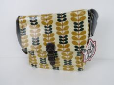 A leaf patterned handbag in yellow 'as new', approx 30 x 26cm.