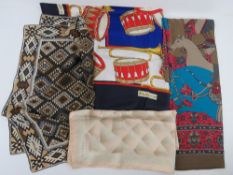 A Burberry silk scarf having drum and trumpet design upon.