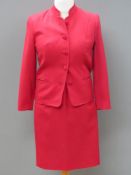Designed and made by Rosemarie van Bree; Two-piece skirt suit in red,