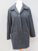 A wool and mohair coat by Wallace size 10, 50% mohair and 30% virgin wool.