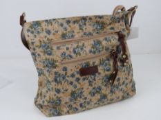 An 'as new' fabric tote bag having blue floral pattern 34 x 30cm.