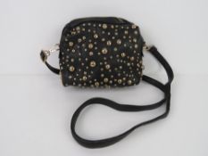 A black handbag with stud decoration 'as new', approx 20 x 17cm.